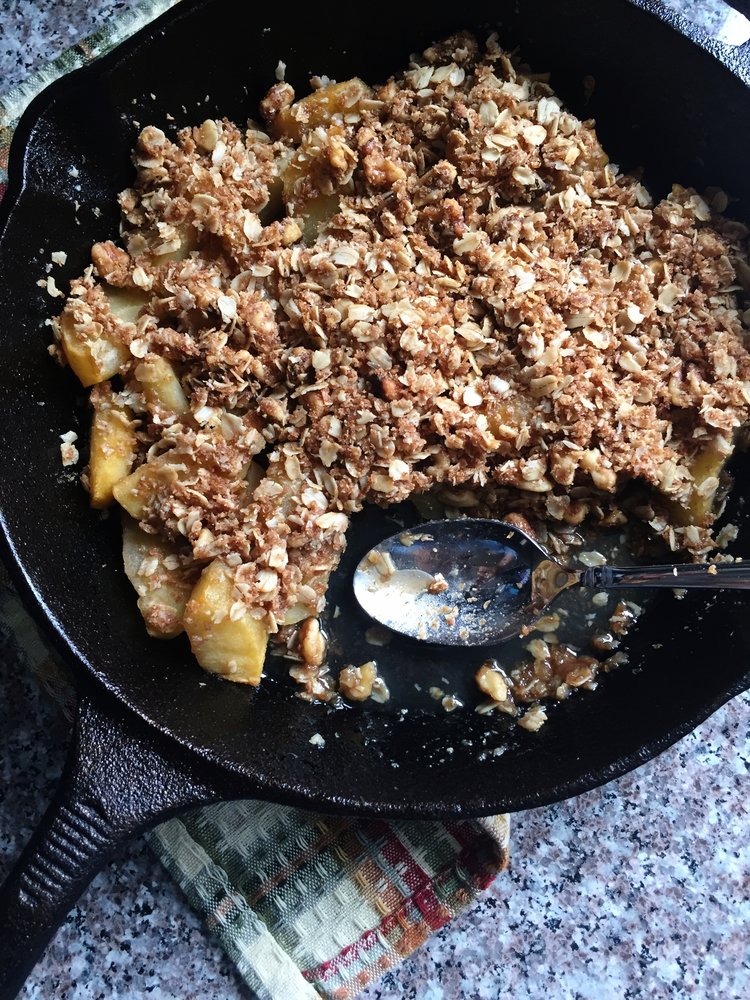 apple crisp in a cast iron skillet