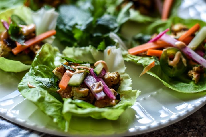 tofu bahn mi lettuce wraps on a plate