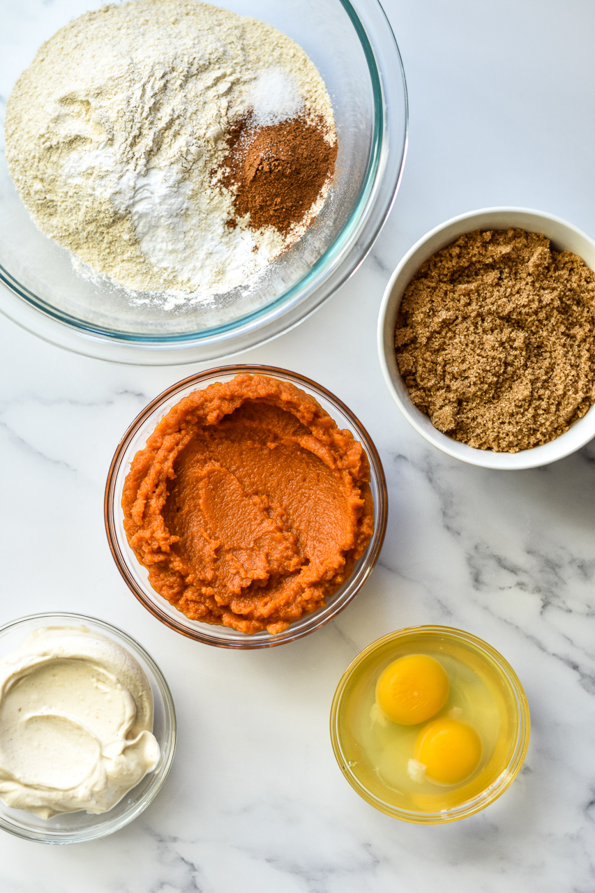 pumpkin blueberry muffin ingredients separated into bowls