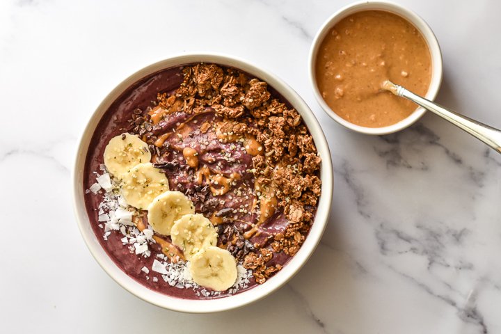 smoothie bowl with peanut butter on the side