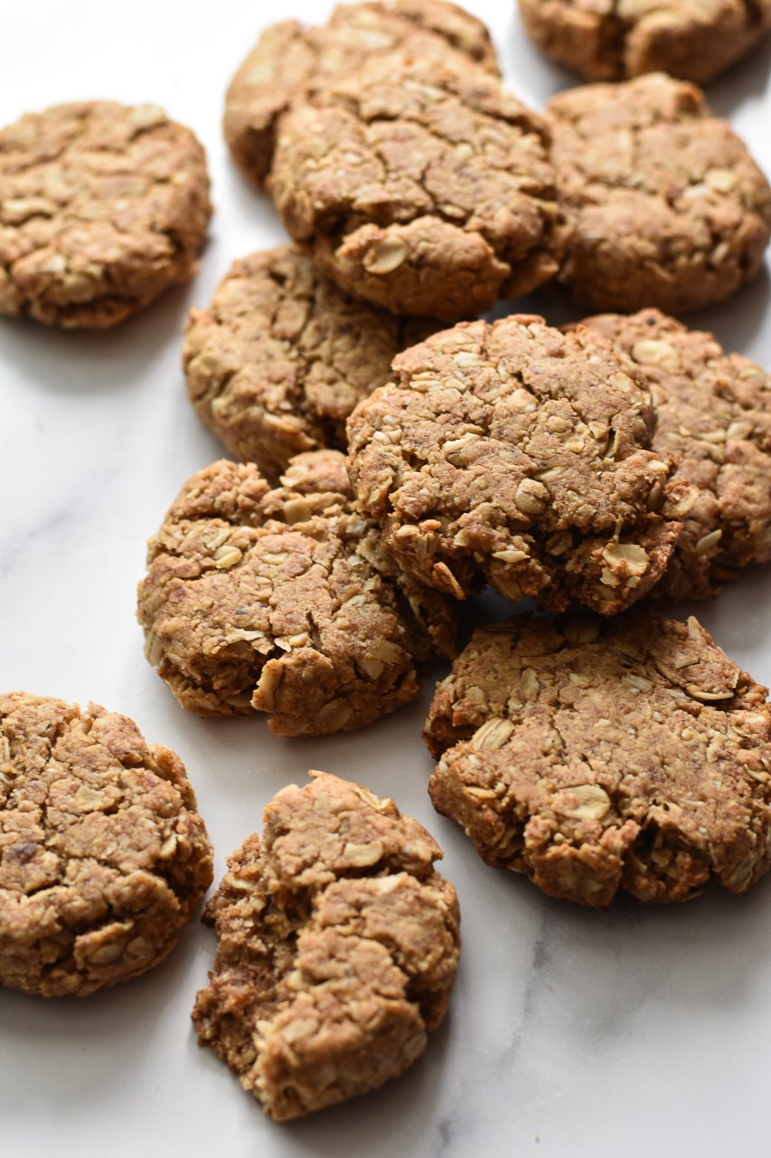 vegan oatmeal cookies scattered on counter