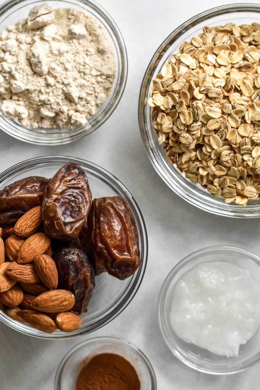 vegan oatmeal cookie ingredients in bowls