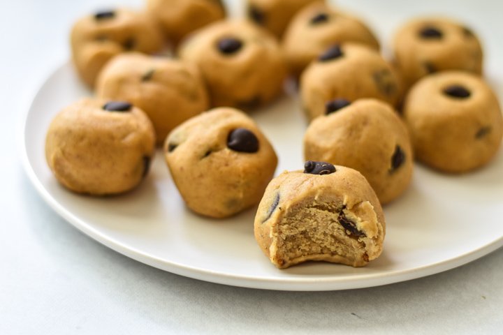 vegan chickpea cookie dough bites with bite taken out of one