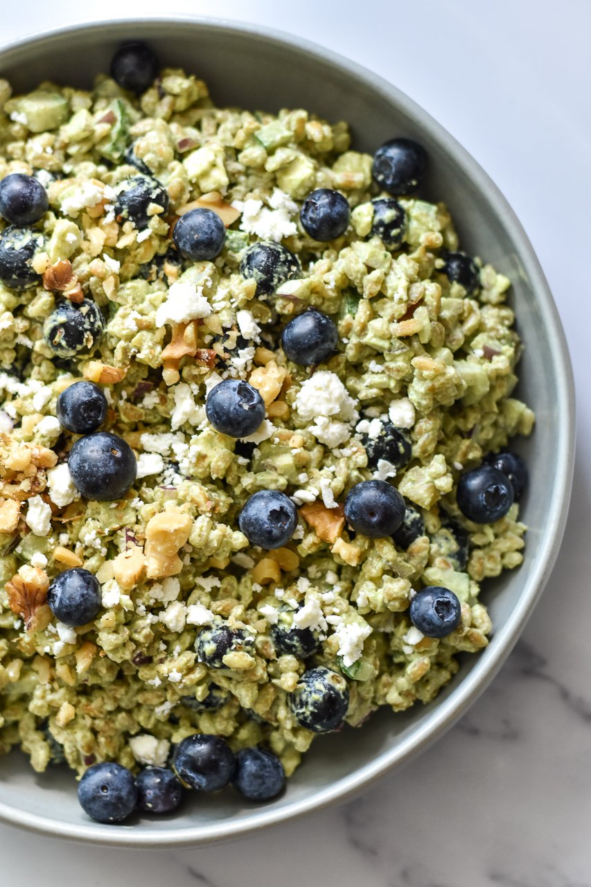 summer farro salad with blueberries feta and walnuts in a serving dish