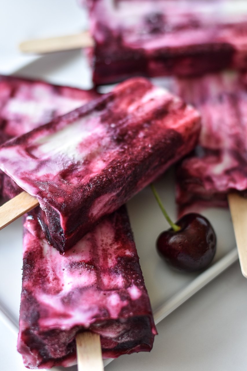 cherry goat cheese paletas on a plate