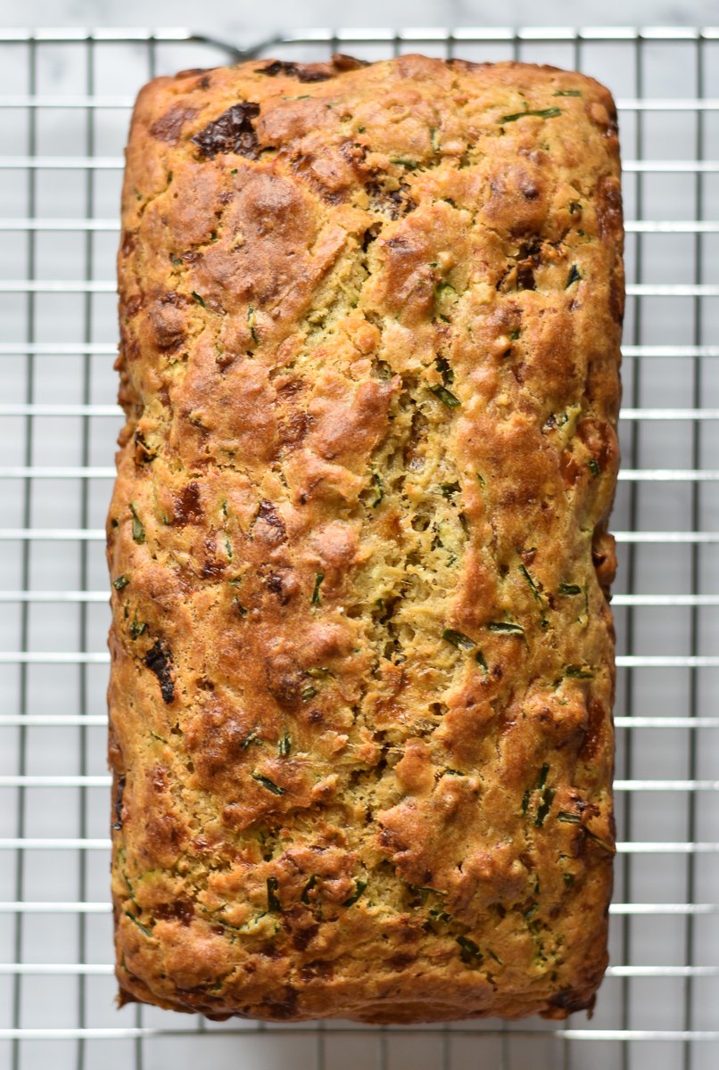 savory zucchini bread on a cooling rack