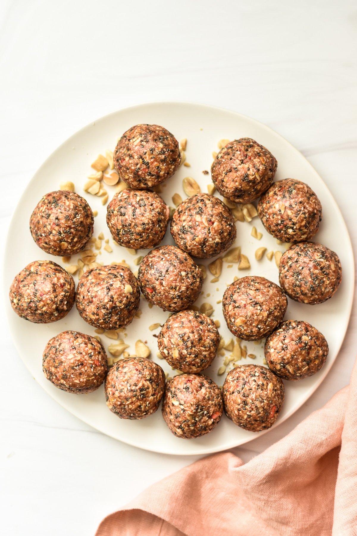 peanut butter and jelly oatmeal energy bites on a plate