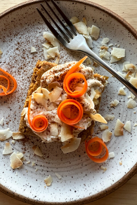 carrot cake baked oats on a plate with fork