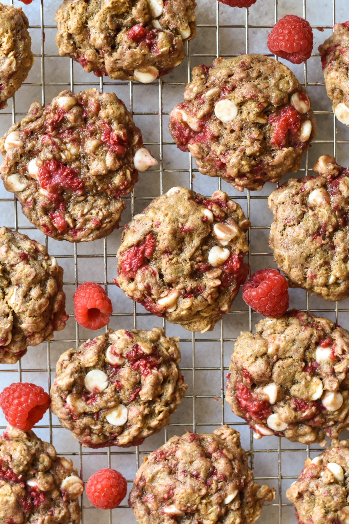 white chocolate raspberry cookies on a cooling rack