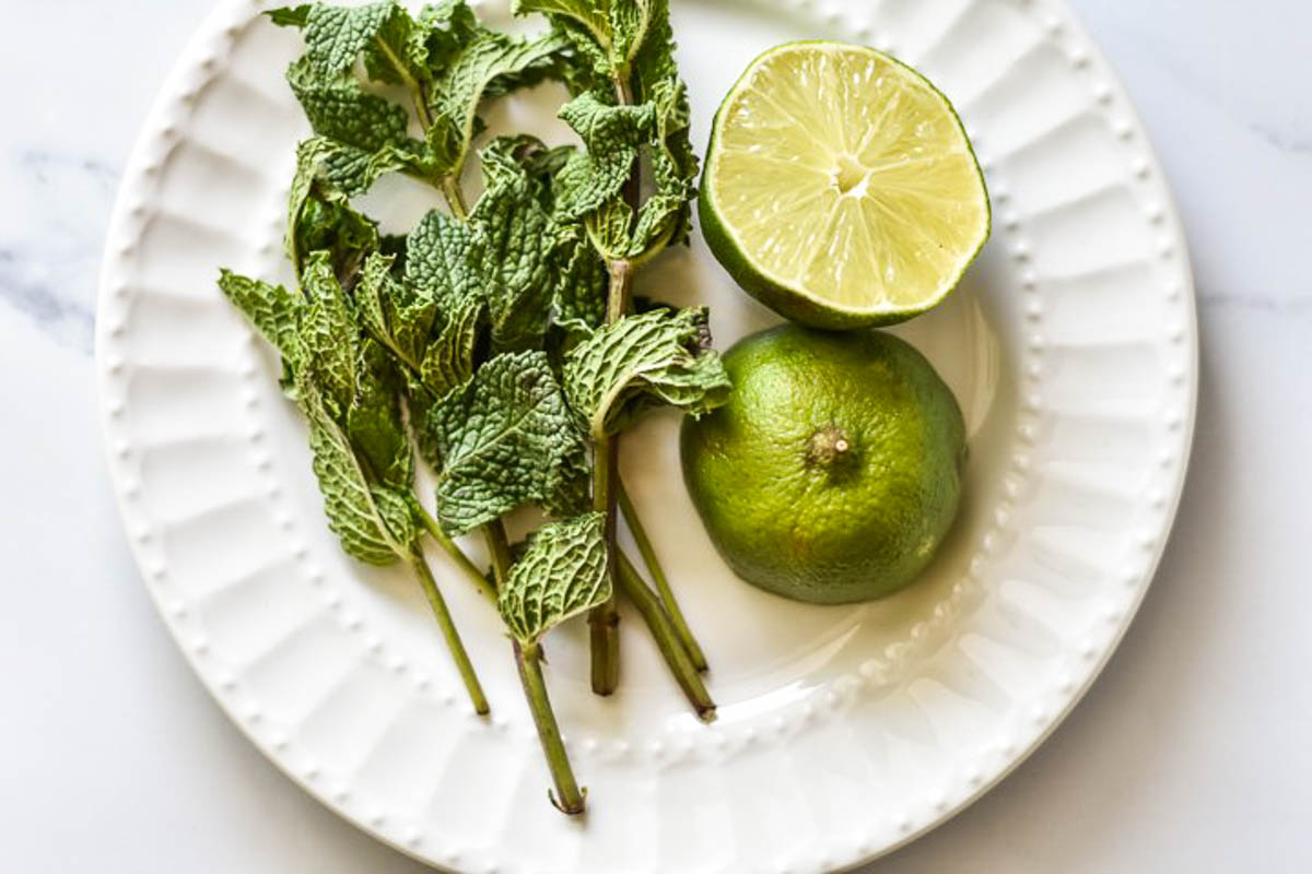 mint and limes on a plate