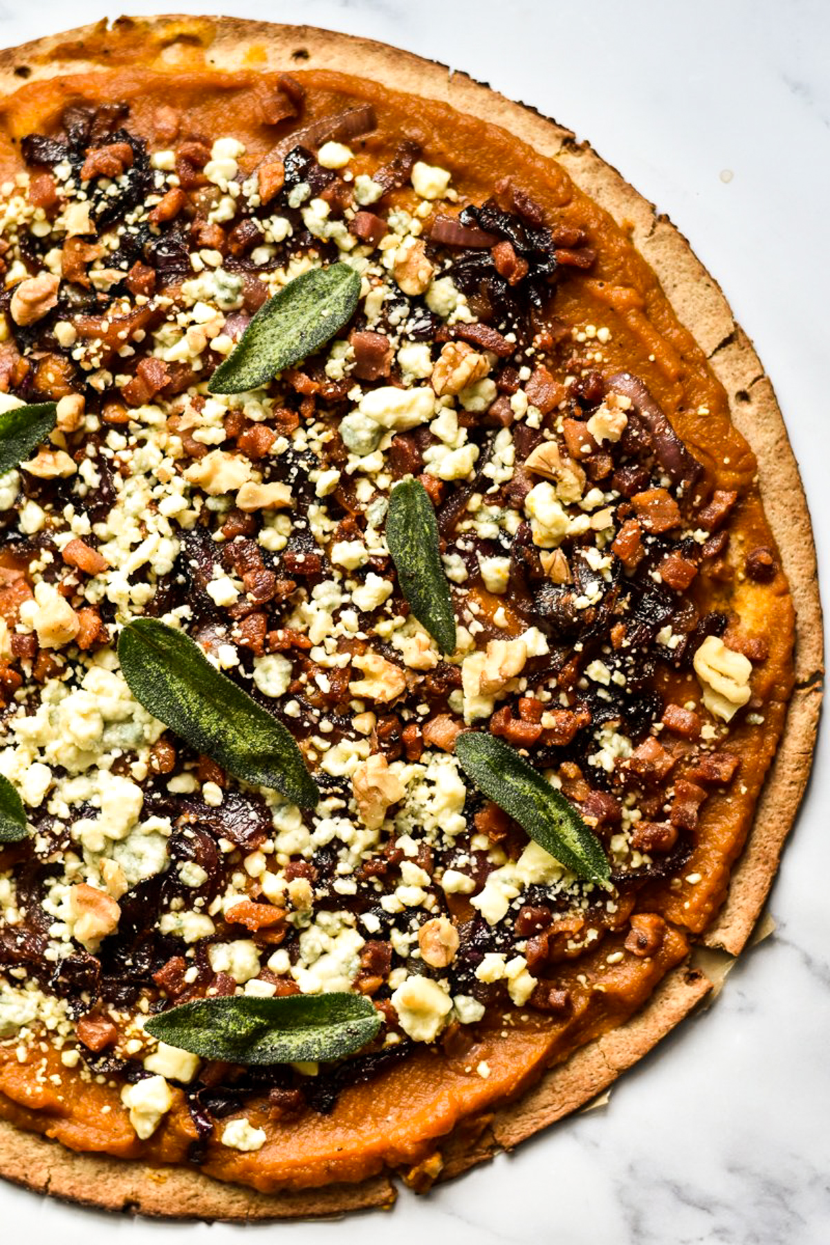 pumpkin pizza with blue cheese and pancetta and crispy sage leaves