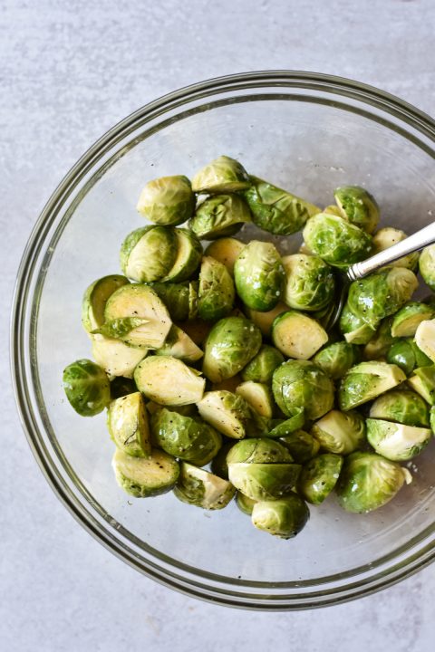 bowl of brussels sprouts tossed with olive oil