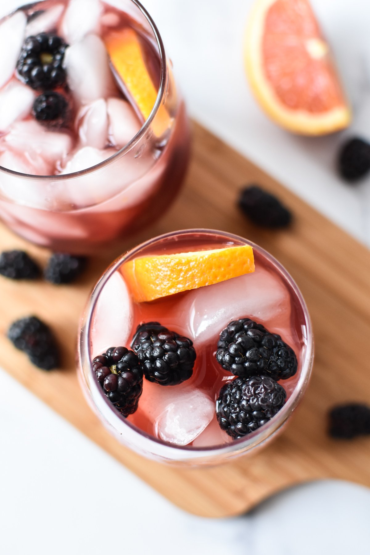 overhead view of sangria mocktail with blackberries