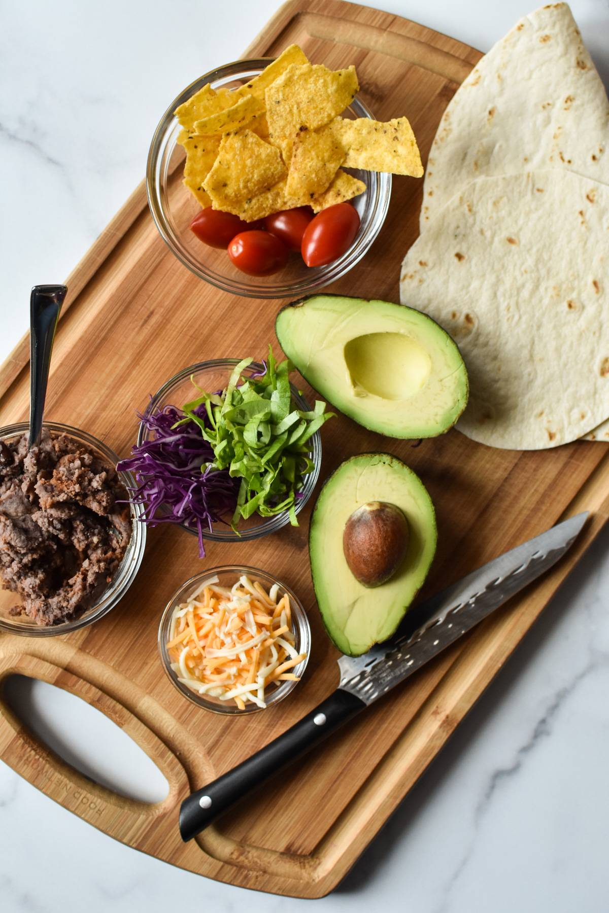 crunchwrap ingredients on a cutting board