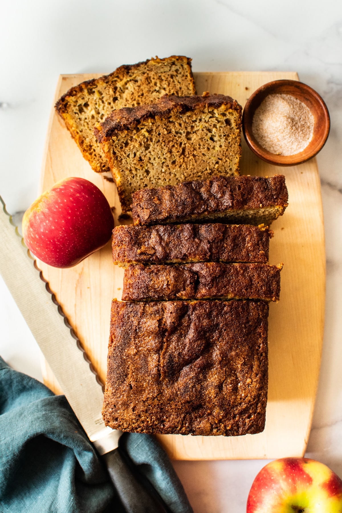 load of bread with apple and chia spices on a cutting board