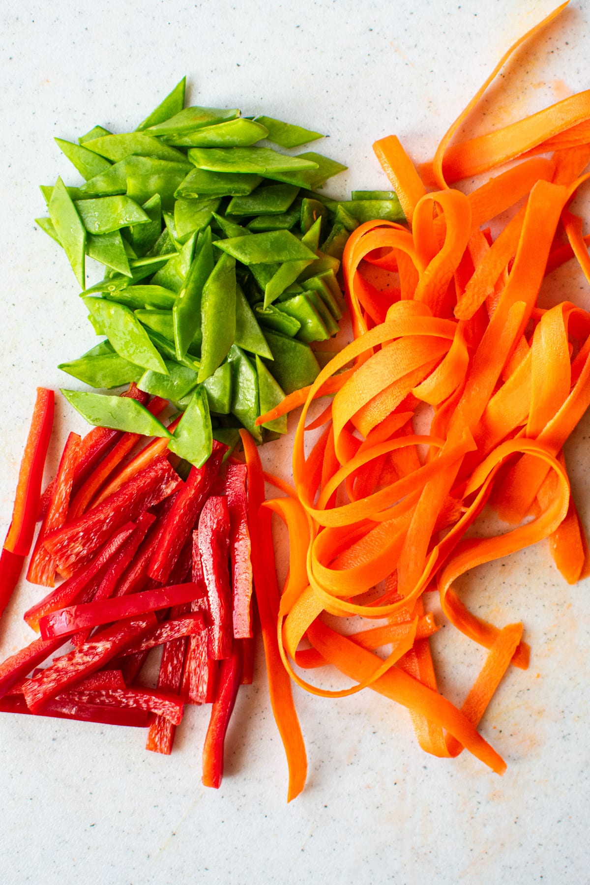 fresh snap peas, carrots and red bell pepper strips